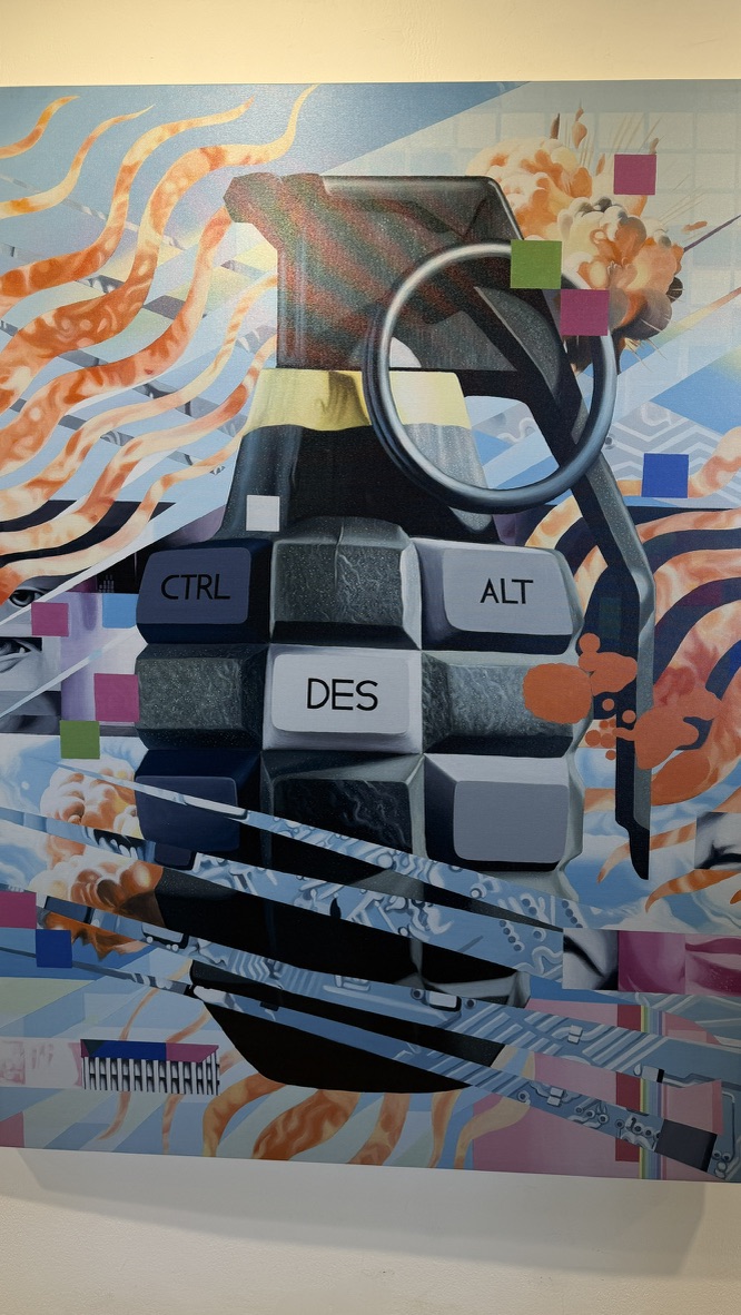A colorful artwork shaped like a grenade made from oversized keyboard keys spelling CTRL ALT DES